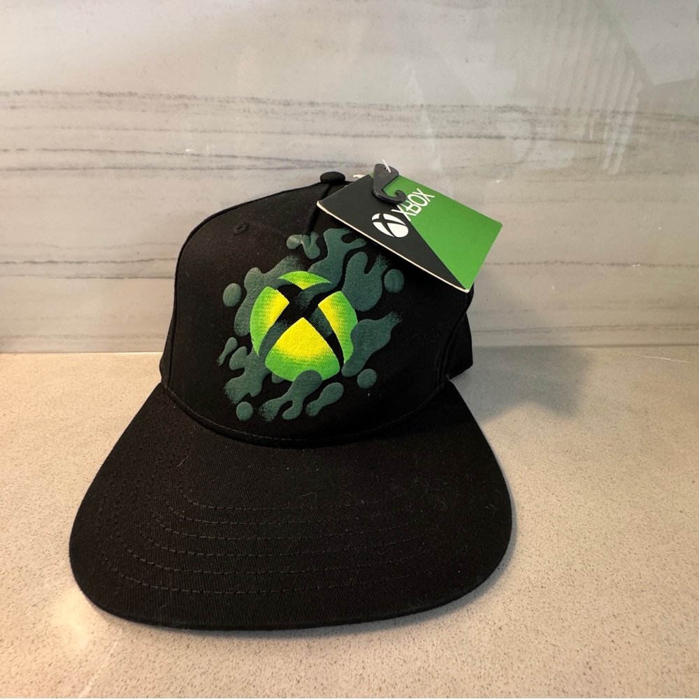 X Box Black SnapBack Ball Cap Video Game Themed Streetwear with Neon Green Logo